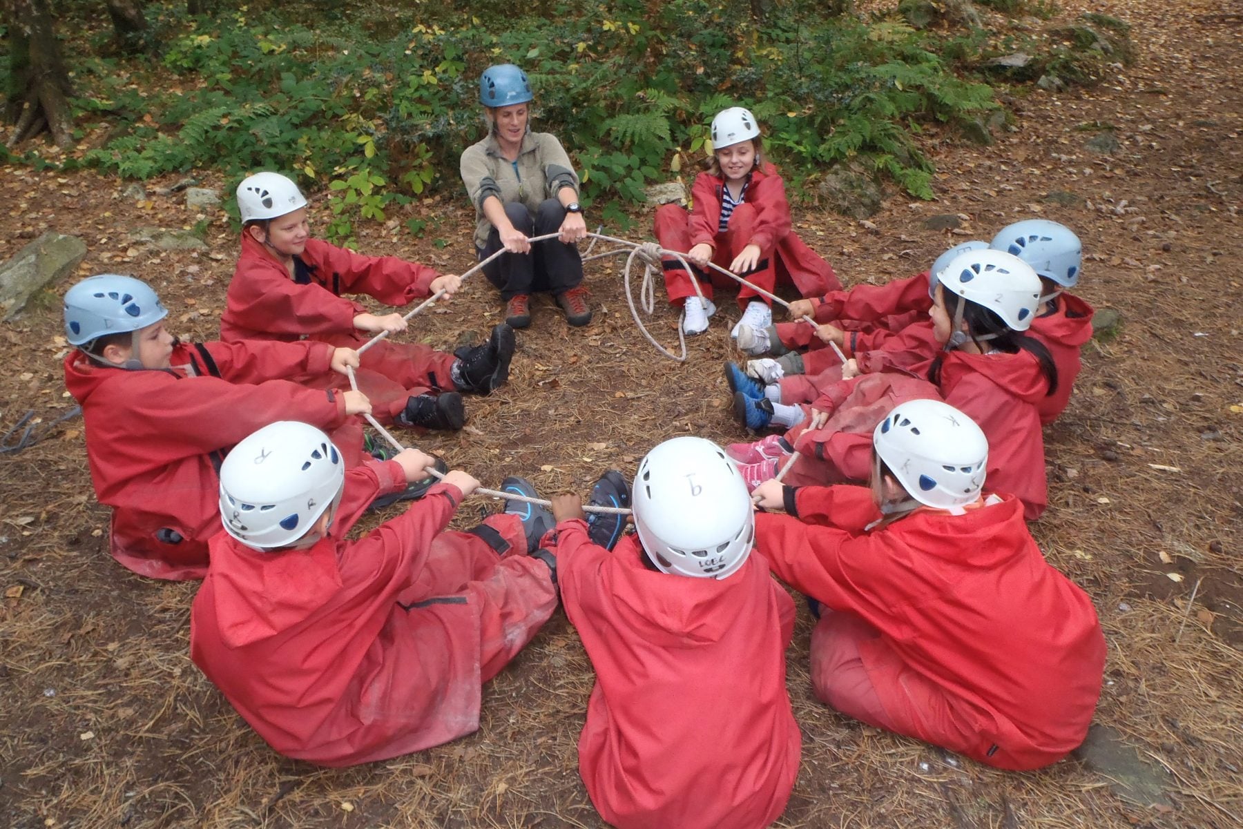 Primary school group team building with rope loop