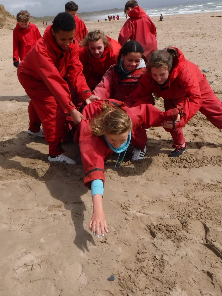 outdoor team building on the Welsh beach